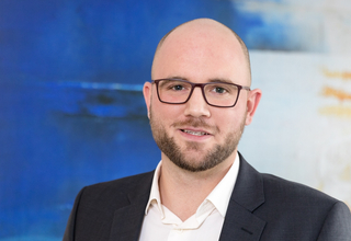 Portrait von BKK VBU Mitarbeiter David Kiel